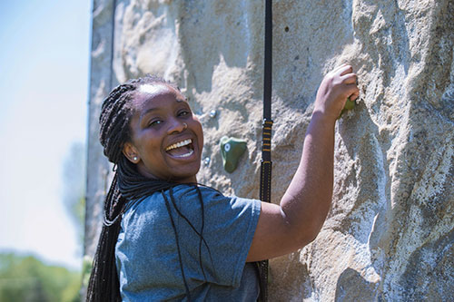 Female student climbing