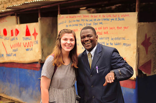TMU student with an African Pastor